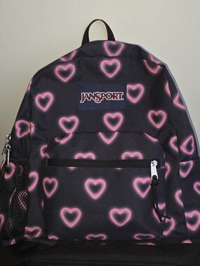 Jansport Black Backpack with Neon Pink Heart Pattern